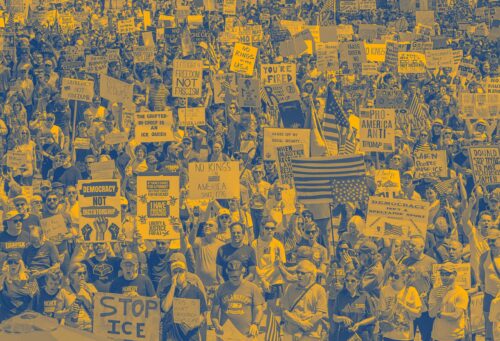 Protesters holding signs at a march