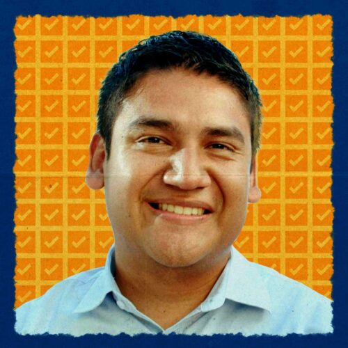 A photo of Randy Villegas with checkmarks in the background indicating his primary victory.